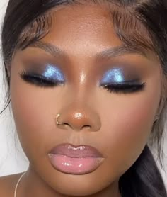 Jt Inspired Makeup, Makeup Looks Pop Of Color, Gold Blue Eye Makeup, Caribbean Carnival Makeup Ideas, Dark Brown Eye Makeup Pop, Blue Chrome Eyeshadow, Pastel Blue Makeup Looks, Prom Makeup Navy Blue, Blue Makeup On Black Women