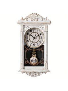 a white clock with an ornate design on the front and sides, sitting against a white background