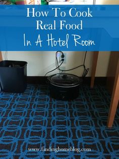 a blue carpet with the words how to cook real food in a hotel room on it