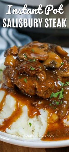 an instant pot salisbury steak with mashed potatoes and gravy on a white plate