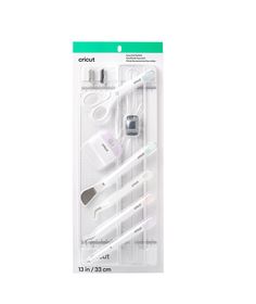 three toothbrushes and an electronic charger in a package on a white background