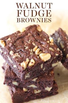 three brownies stacked on top of each other with walnut fudge in the middle