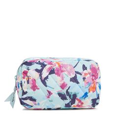 a floral print toilet bag on a white background