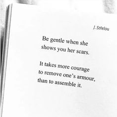 an open book with a poem written in black and white on the page, which reads be gentle when she shows you her scars it takes more courage to remove one's