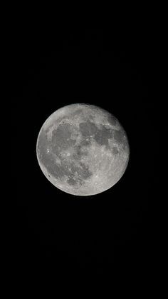 the full moon is seen in the dark sky