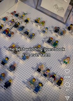 the best wedding guest book i've ever seen is displayed on a table with legos