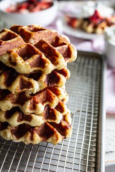 stack of waffles sitting on top of a cooling rack