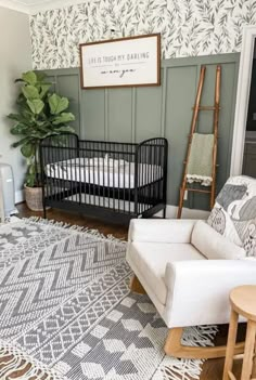 a living room filled with furniture and a baby crib