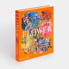 an orange book with flowers on it