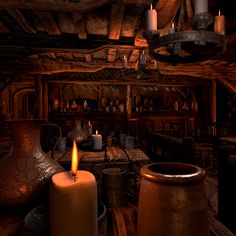 a candle is lit in front of an old - fashioned room with other items on the table