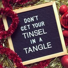 a sign that says don't get your tinsel in a tangle