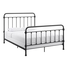 a black metal bed frame with white sheets and pillows on top of it, against a white background