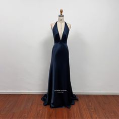 This dress can be made to order in custom size. I have some stock for size US2, US4, US6, US8, US10. For custom size, please message me your bust/waist/hips measurements and your height. Below are the measurements of standard size 2 to size 10 in inches: Size 2(inches): Bust=32 Waist=25 Hips=35 Height=65 Size 4(inches): Bust=33 Waist=26 Hips=36 Height=65 Size 6(inches): Bust=34 Waist=27 Hips=37 Height=65 Size 8(inches): Bust=35 Waist=28 Hips=38 Height=65 Size 10(inches): Bust=36 Waist=29 Hips=39 Paloma Dress James Bond, Silk Navy Dress, Fitted V-neck Gown With Bias Cut, Satin V-neck Gown With Sweep Train, V-neck Evening Dress With Back Opening For Wedding, Prom Satin V-neck Dress With Bias Cut, Fitted Satin V-neck Bridesmaid Dress, Fitted Bodice V-neck Prom Gown, V-neck Gown With Fitted Bodice For Prom