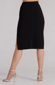 Double layer, straight silhouette fitted skirt with elegant slits on either side in classic black - works for tango as well as the office. Size & Fit Straight Skirt Double Layer Fabric Front length 70cm (28") Slits on both sides 22cm (9") Model is 171cm (5'7") tall and wears size S Unsure of the right fit? Check our size chart or send us a quick message. Details & Care Machine washable. Gentle cycle at 30°C (86°F). Use a mesh lingerie bag to protect the fabric from snags, tangles and tears. Wash Tango Skirt, Straight Skirt, Fitted Skirt, Fit Check, Tango, Classic Black, The Office, Double Layer, Your Perfect