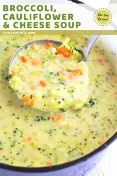 broccoli, cauliflower and cheese soup in a pot with a spoon