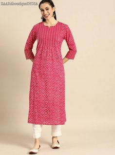 *Women Pink & White Bandhani Printed Kurta * Colour: pink and white *Bandhani printed * Round neck *Three-quarter sleeves, regular sleeves * Straight shape with regular style * Sequins detail Calf length with straight hem *Fabric:- 100% cotton *Wash Care:- Machine Wash AVAILABLE IN 8 SIZES THEY ARE IN FOLLOWING MEASUREMENTS IN INCHES:- XS:- Bust-34/To Fit Waist-28/Length-46/Hip-38 S:- Bust-36/To Fit Waist-30/Length-46/Hip-40 M:- Bust-38/To Fit Waist-32/Length-46/Hip-42 L:- Bust-40/To Fit Waist-3 Indian Dress For Women, Indian Dresses For Women, Kurti For Women, Printed Kurti, Trendy Blouses, Trendy Blouse Designs, Indian Dress, Cotton Kurta, Dress For Women