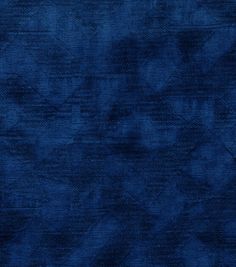 an image of a blue background that looks like it has been dyed with dark colors