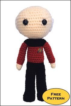 a crocheted doll with black pants and red shirt is shown in front of a white background