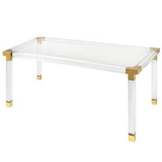 a clear and gold coffee table with two legs on the bottom, in front of a white background