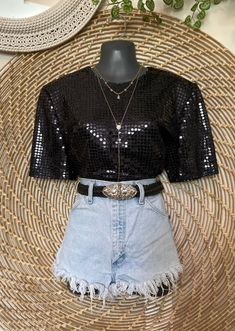 Vtg 1980s black, sequined-material blouse. Lined and has a boxy kind of shape, almost t-shirt like. Loop and button closure in the back. Looks great dressed down with biker shorts and sneakers. Brand: Maggy London Blouses Material: 64% Nylon, 36% Metallic Size: 8 (size printed on tag, but look to measurements for more accurate fit) Measurements taken with garment flat: (bust measurement has been doubled) Bust: 39 in. Shoulder to Hem Length: 25.5 in. Sleeve Length: 10.5 in.  Condition:  Excellent Black Celebration, Kinds Of Shapes, Short Sleeve Shirt Women, Holiday Wear, Sequin Shorts, Maggy London, Blouse Material, Just A Reminder, Blouse Vintage