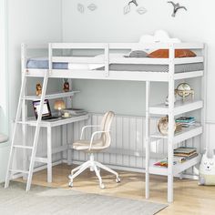 a white bunk bed sitting next to a desk and chair