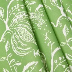 a green and white floral print fabric