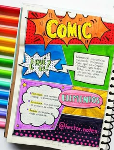 an open comic book with colored pencils next to it