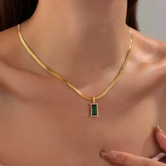 Snakechain Green Lover Necklace -18k Gold Plated Stainless Steel -Green Cubic Zircon -Made To Last,Made For Comfort -Sizes: 15” + 2” Extender -Perfect For Everyday Wear Pairing With Any Outfit *Bundle & Save An Extra 10% Off Gold Necklace Unique Design, Rectangular Gold Plated Necklace, Gold Plated Rectangular Pendant Charm Necklace, Fine Jewelry Gold Emerald Rectangular Necklace, Fine Jewelry Gold Emerald Necklace, Gold Emerald Necklace In Fine Jewelry Style, Gold Rectangular Emerald Necklace In Fine Jewelry Style, Gold Emerald Necklace Fine Jewelry, Elegant Green Jewelry With Gold Chain