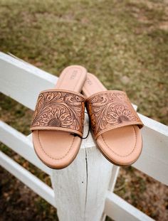 Genuine leather western sandals! These are perfect for your Nashville trip or even just brunch out! please size up, these run on the small side. I do not recommend for wider feet! Hand Tooled Open Toe Sandals For Spring, Hand Tooled Closed Toe Sandals For Spring, Summer Hand Tooled Sandals, Western Style Slip-on Summer Mules, Western Style Summer Slip-on Mules, Summer Leather Sandals With Hand-tooled Details, Hand Tooled Sandals For Beach And Spring, Western Style Open Toe Sandals For Spring, Hand Tooled Closed Toe Sandals For Summer