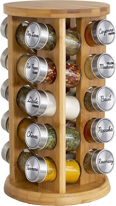 a wooden spice rack filled with lots of spices