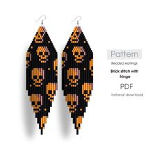 two black and yellow beaded earrings hanging from hooks on a white background with the words pattern