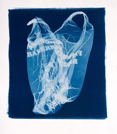 a blue and white photo of a plastic bag