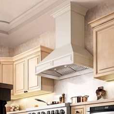 a stove top oven sitting inside of a kitchen next to wooden cabinets and counter tops