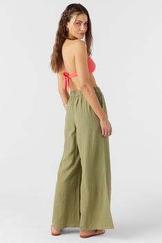 Cute and lightweight pull-on pant that has a solid color design and comfort elastic waist. O'Neill Women's woven pant Flowy leg Elastic waistband Solid color wash 100% Cotton Crinkle Double Gauze Green Pull-on Straight Pants, Green Pull-on Pants For Loungewear, Casual Khaki Beach Bottoms, Green Casual Pull-on Bottoms, Summer Straight Pants With Pull-on Style, Green Bottoms For Loungewear With Loosely Fitted Hips, Spring Beach Parachute Pants With Pockets, Beach Khaki Cotton Pants, Green Straight Leg Bottoms For Loungewear