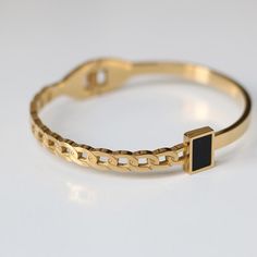 This bracelet is lightweight and easy to wear, and lend a modern edge to your jewelry wardrobe. It goes well with our BLACK GEMSTONE RING. Material: 316L Stainless Steel, 18k Gold Plated Size: 6"-7.5" Origin: California, USA Each product packed with SOCALI premium pouch and box, together with silver cleaning cloth and card. Material Our products are made from the top-grade 316L stainless steel - a metal that is nickel-free and does not fade or blacken and 100% hypoallergenic for the benefit of t Black Gemstone Ring, Modern Bangle, Jewellery Photo, Ladies Bangles, Kundan Jewellery Set, Silver Cleaning, Jewelry Wardrobe, Gemstone Bangle, Gold Plated Bracelet