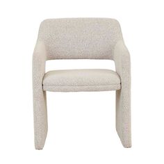 an upholstered white chair on a white background