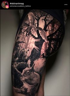 an arm with some animals on it and trees in the background that are black and white