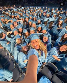 a group of people in graduation caps and gowns