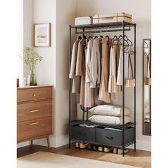 an open closet with clothes and shoes on the shelves, next to a chest of drawers