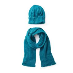 a blue hat and scarf on a white background