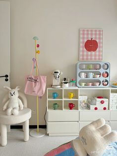 a child's room with toys and decor