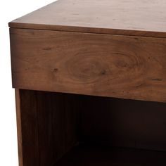 a close up of a wooden table with one drawer open