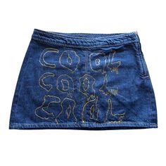 Add a bold, artistic touch to your wardrobe with this hand-embroidered denim mini skirt. Featuring two unique designs, it brings a playful twist to retro streetwear: "DANCE" embroidery - perfect for those who love to express themselves. "COOL" embroidery - for carefree, fashion-forward individuals. This skirt's A-line silhouette flatters all body types and offers both comfort and style. Made from high-quality denim, it's durable yet lightweight, making it a versatile piece for every season. Whether you're out dancing, attending a festival, or styling an everyday look, this skirt will make sure you stand out in every crowd. Details: Size: M - bust(in) 37.8 waist(in) 31.5 Material: Denim Length: Mini skirt Color: Dark blue with hand-embroidered yellow lettering Special Design: Each skirt is Dance Embroidery, Carefree Fashion, Cool Embroidery, Mini Rock, Creative Outfits, Denim Embroidery, Jean Mini Skirt, Retro Jeans, Jean Mini Skirts