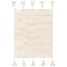 a white rug with tassels on it