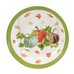 a green and white plate with autumn vegetables painted on the side, sitting in front of a white background