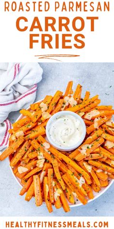 roasted parmesan carrot fries on a white plate with ranch dip in the middle