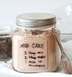 a jar filled with cake mix sitting on top of a table