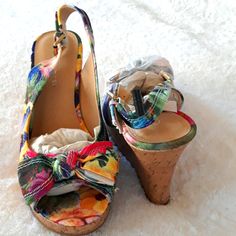 Nwot - Floral Summer Wedge, Material: Canvas, Color: Multi-Purple-Yellow-Green-Lavender-Fushia-Pink. Heel Height: 4", Slingback Style With Bow-Tie At Toe. Really Pretty And Will Go With Anything, Jean's, Skirts, Dresses, Shorts. Multicolor Floral Print Heels With Round Toe, Multicolor Floral Print Synthetic Sandals, Purple Wedge Heels For Spring, Purple High Heel Wedge Sandals For Spring, Purple Round Toe Wedge Sandals For Spring, Multicolor Wedge Heel For Spring, Multicolor Wedge Heels For Spring, Multicolor Floral Print Wedge Heels, Multicolor High Heel Fabric Sandals