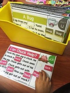 a child's hand is on a stack of books with the words can chuck help?