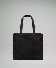 Daily Multi-Pocket Tote Bag 20L | Unisex Bags,Purses,Wallets | lululemon in Black Lululemon Bags, Picnic Essentials, Essential Bag, Work Bags, Bags Purses, Black Tote Bag, Gifts For Mum, You Bag, Belt Bag